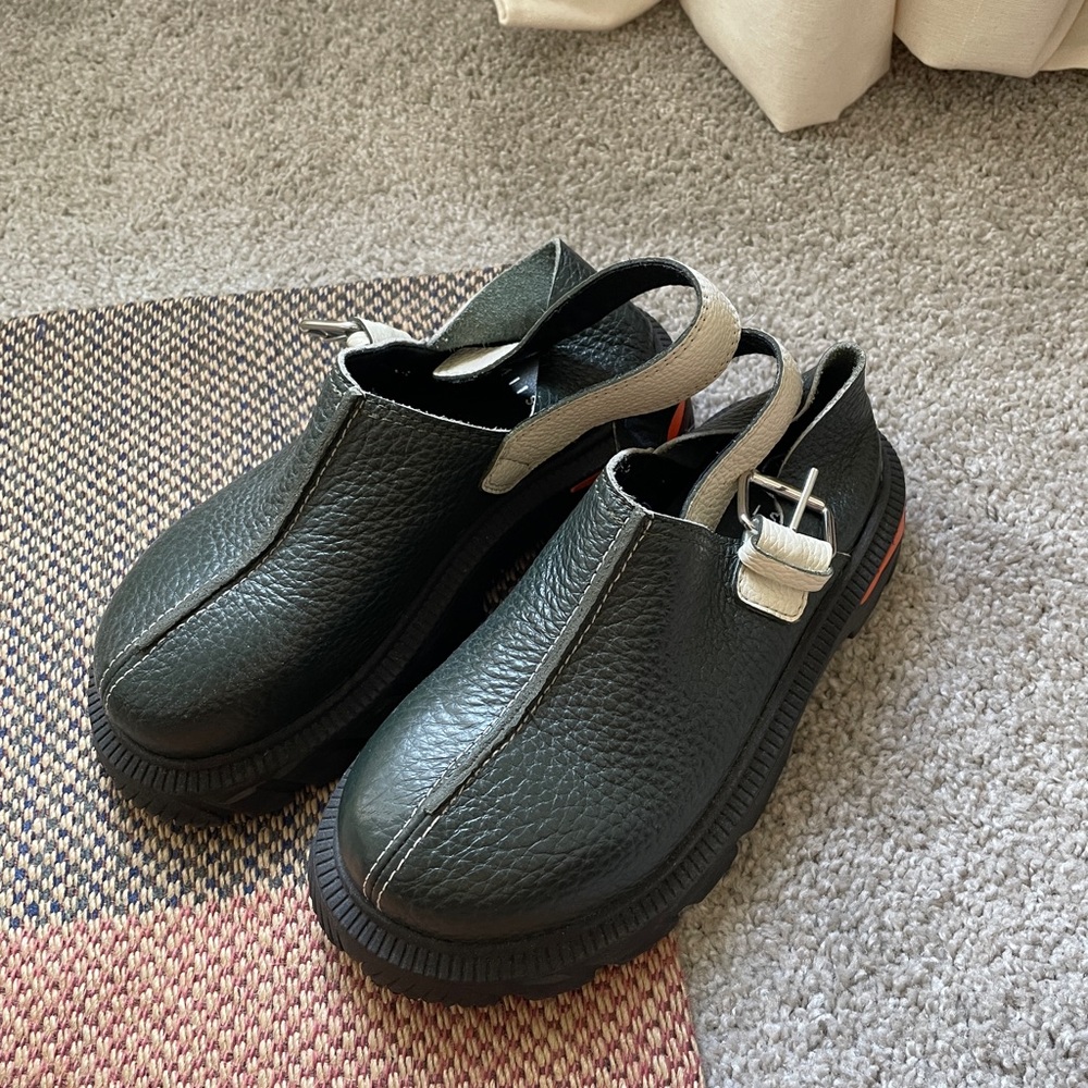 Miista green and black clogs